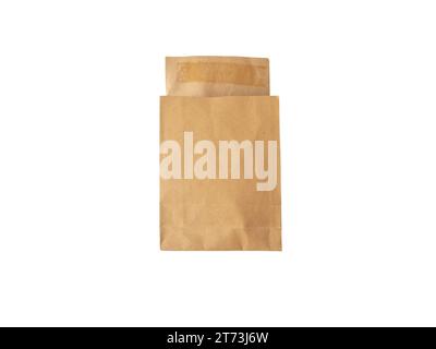 Paper courier bag with flap and traces of glue and isolated on white. Open retail or postal packaging envelope made from brown kraft recycled paper. E Stock Photo