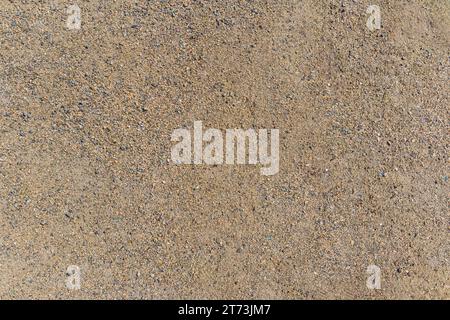 sand texture close up background, light brown desert dune surface. Stock Photo