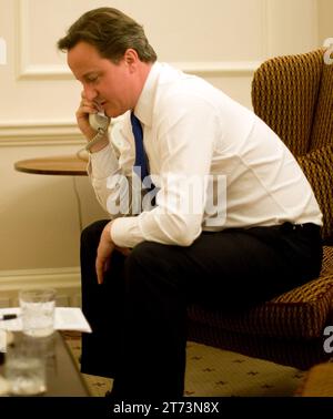 London, UK. 11th May, 2010. Image © Licensed to Parsons Media. 13/11/2023. London, United Kingdom. David Cameron appointed Foreign Secretary. Britain's new Prime Minister David Cameron talks to President Barack Obama on the phone in Number 10 Downing St, Tuesday May 11, 2010, Photo Picture by Credit: andrew parsons/Alamy Live News Stock Photo
