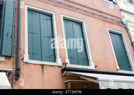 Closed windows on a typical Venetian residential house - detail Stock Photo