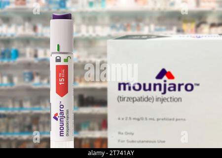 Mounjaro - Tirzepatide with injection pen is an antidiabetic medication used for the treatment of diabetes and to lose weight. Focus on foreground. Co Stock Photo