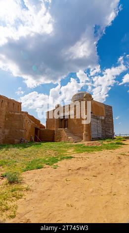 Fragment of the fortress wall and religious building of religious sense from the baked brick smeared with clay Stock Photo