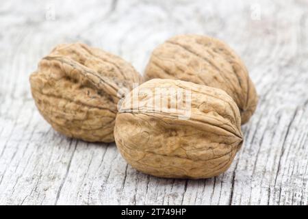 walnuts on wooden background - close up Stock Photo