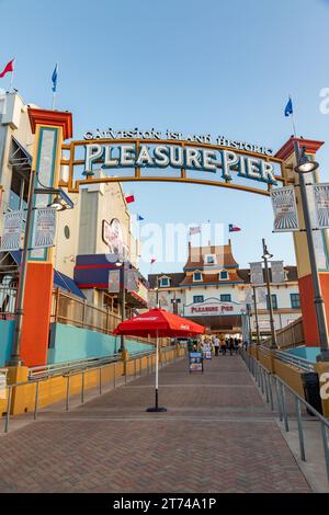 Galveston, USA - October 28, 2023: Pleasure Pier in Galveston Island in afternoon light, Texas, USA. Stock Photo