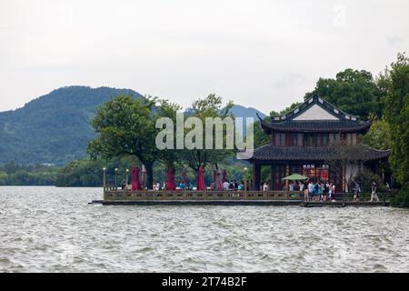 Hangzhou, China - August 13 2018: Autumn Moon on Calm Lake in West Lake. Stock Photo