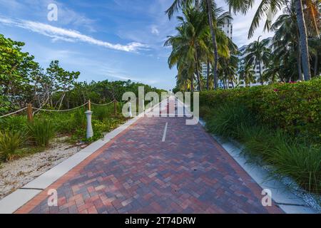 Beautiful view of architecture along Atlantic coastline from paving stones of red trail called Walking Street in Miami Beach. USA. Stock Photo