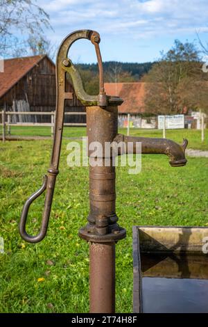Old water pump in an old farmes village Stock Photo