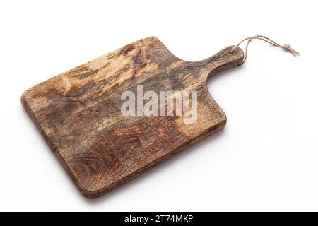Cutting board. Old, vintage, wooden chopping board isolated on white background. Stock Photo