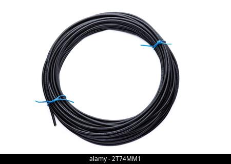Black wire cooper cable isolated on a white background. Stock Photo