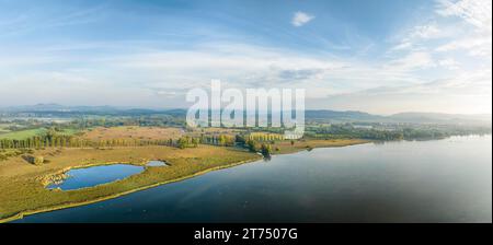 Aerial panorama of the western part of Lake Constance with the Radolfzeller Aachried and the reed belt with the Aach estuary, on the far right the Stock Photo