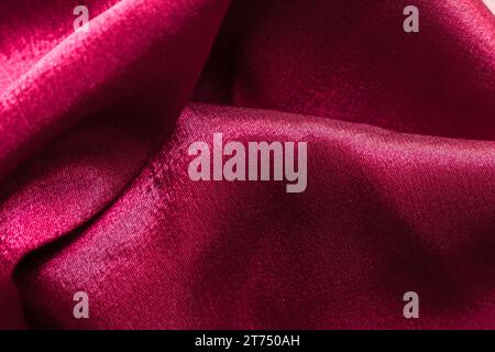 Close up texture burgundy fabric suit Stock Photo