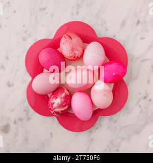 Set pink easter eggs plate Stock Photo