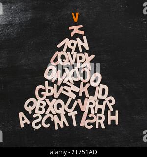 Christmas tree made from wooden letters Stock Photo