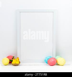 Colourful easter eggs with blank frame table Stock Photo