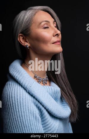 Side view senior woman portrait Stock Photo
