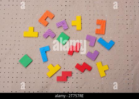 Concept of creative logical thinking. Different colorful wooden blocks. Geometric shapes in different colors Stock Photo