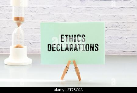 torn paper on wooden cubes with text REGULATION Stock Photo