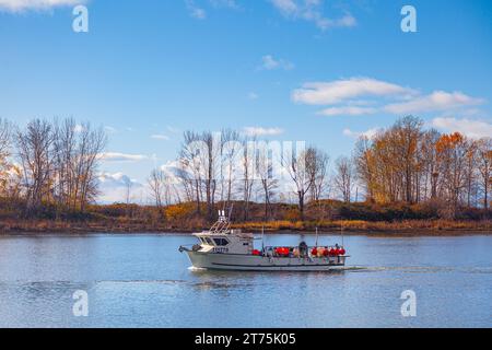Commercial fishing vessel returning to Steveston Harbour in British Columbia Canada Stock Photo