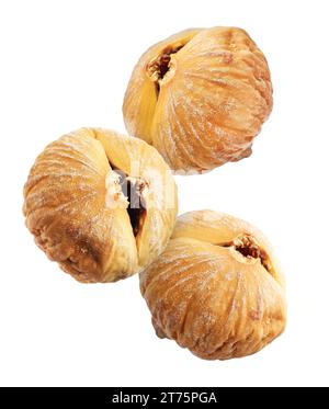 Dried figs falling on white background. Exotic fruit Stock Photo