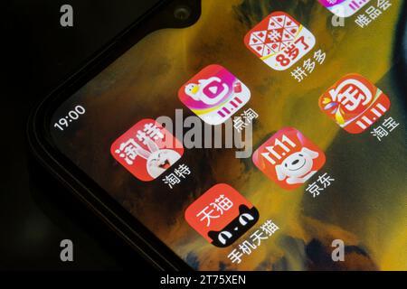 Assorted Chinese e-commerce apps - JD.com, Pinduoduo, and Alibaba's Tmall, Taobao, Taote, and Diantao - are seen on a smartphone before the Double 11... Stock Photo