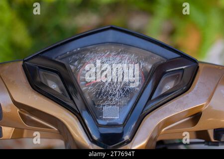 motorcycle dashboard cracked screen due to service life Stock Photo