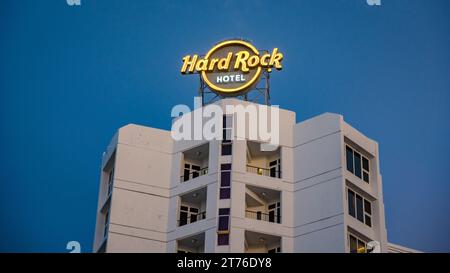 Pattaya Thailand 10 November 2023, Hard Rock Cafe and hotel on the beach road , logo of the Hard Rock hotel neon light in the evening Stock Photo