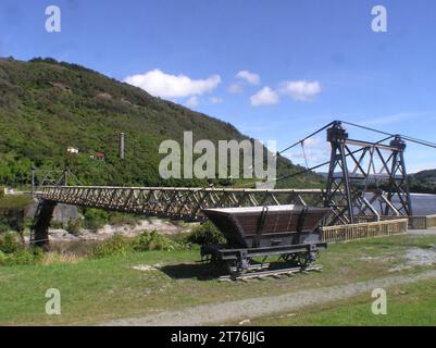 historic chimney and swing bridge at Brunner Coal Mine, West Coast, South Island, New Zealand Stock Photo