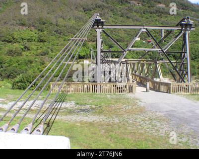 historic swing bridge at Brunner Coal Mine, West Coast, South Island, New Zealand Stock Photo