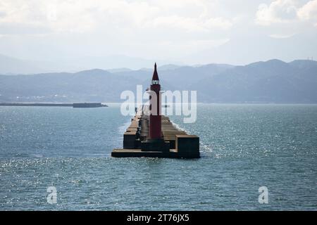 Red lighthouse in the port of Niigata on the northern coast of Japan. Stock Photo