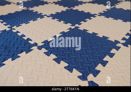 foam flooring tiles or jigsaw mat for baby. background and texture Stock Photo