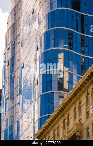 Close up view of reflection in glass on the side of a high rise building in Melbourne, Victoria, Australia. Stock Photo