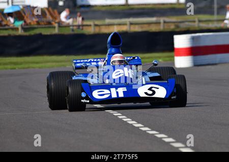 Jackie Stewart, Tyrrell-Cosworth 006, Sir Jackie Stewart Celebration, Sir Jackie driving the Tyrrell-Cosworth 006 in which he won the 1973 Formula One Stock Photo