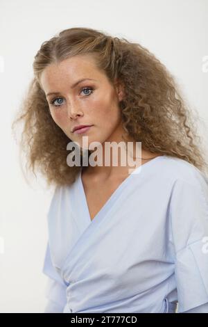 Young Woman with Crimped Hair Stock Photo