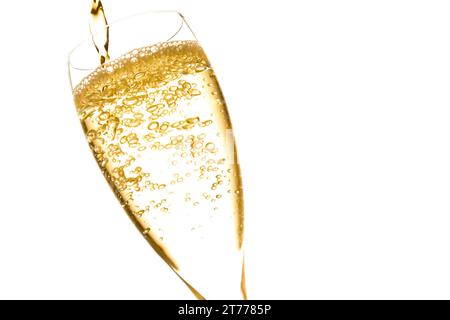 champagne flute with golden fine bubbles on white background Stock Photo
