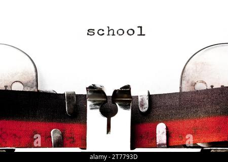 concept image with word school  printed on an old typewriter Stock Photo