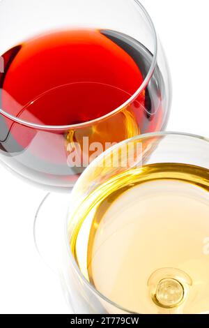 close-up of red and white wine glasses on white table Stock Photo