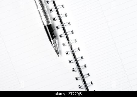 top of view of notebook and business pen in composition Stock Photo
