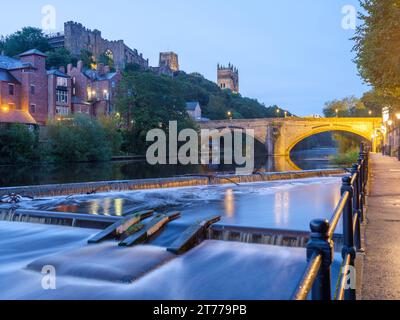 Weir and Framwellgate Bridge in Durham, County Durham with Durham Cathedral behind. Slow shutter is used on River Wear giving a winter feel Stock Photo