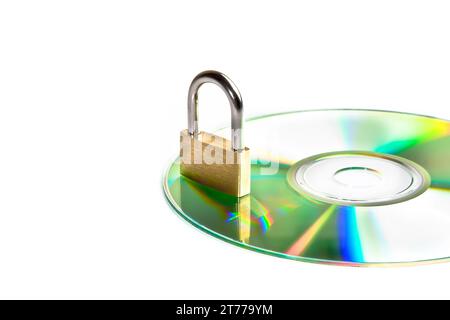compact disk with a security lock, conceptual of data security Stock Photo