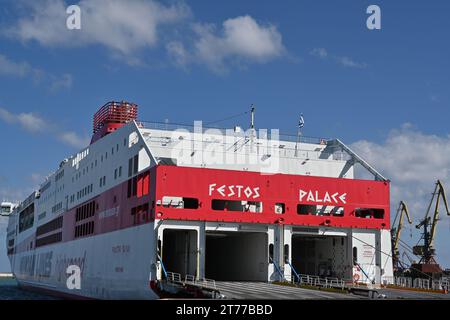 Flagship of the Minoan Lines, cruise ferry with the name Festos Palace, has red and white hull and is moored in port of Heraklion in Crete. Stock Photo