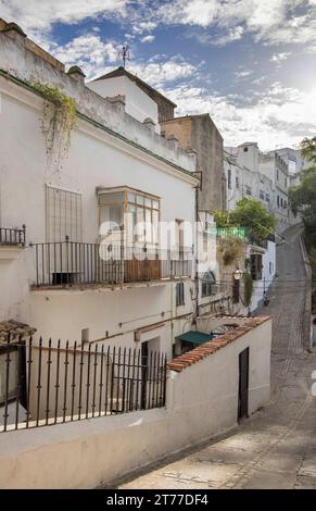 steep twisting lanes in the small hillside town of arcos de la frontera in andalucia spain Stock Photo