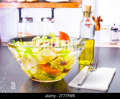 italian fresh salad and tomato on kitchen background nutrition concept Stock Photo
