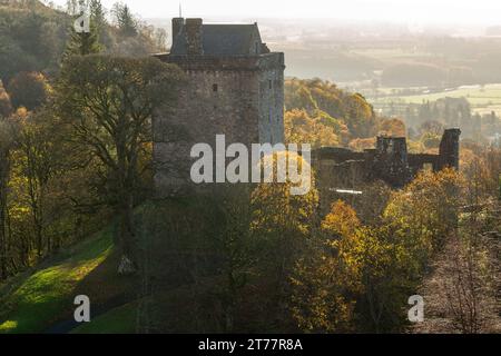 Castle Campbell set in the Ochil Hills looking splendid in Autumn Colours Stock Photo