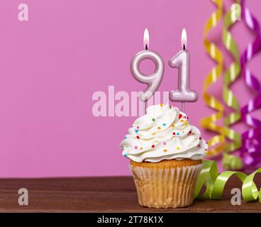 Birthday Cake With Candle Number 91 - On Pink Background. Stock Photo