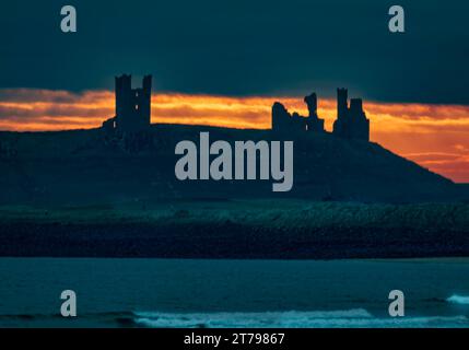 The ruins of Dunstanburgh Castle on the Northumberland coast in Northern England. Stock Photo