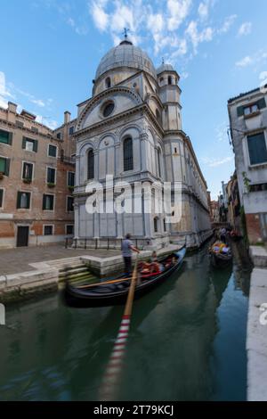 Riding the gondola through Venice, Italy Stock Photo
