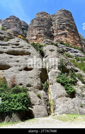 Conglomerate relief. Conglomerate is a clastic sedimentary rock. This photo was taken in Mallos de San Jorge, Vadiello, Sierra de Guara, Huesca, Aragó Stock Photo