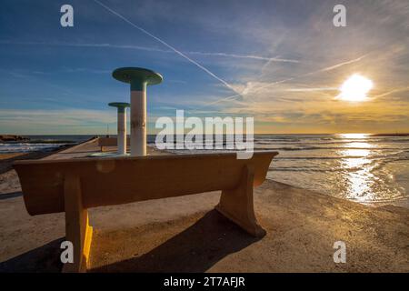 Sunset with the sea in the background in the town of sitges Stock Photo