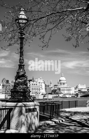View of St Paul's Cathedral from the Queen's Walk on the south bank of The Thames. Black and White, Monochrome. Stock Photo