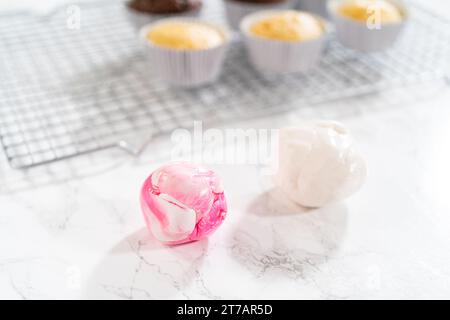 Creating Extravagant Cupcakes for Birthday Celebration Stock Photo